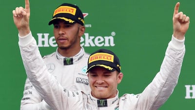 Nico Rosberg celebrates on the podium in front of Lewis Hamilton on Sunday after winning the Italian Grand Prix. Daniel Dal Zennaro / EPA / September 4, 2016