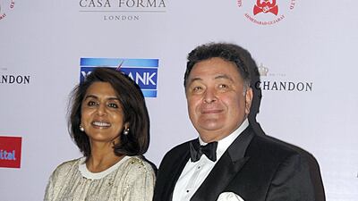Rishi Kapoor poses with his wife Neetu Singh as they attend the Hello! Hall of Fame Awards in Mumbai on April 11, 2016. AFP