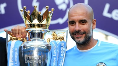 Pep Guardiola celebrates winning the Premier League for the first time with Manchester City following a game against Huddersfield Town on May 6, 2018. The Catalan would go on to win six Premier League titles in all. Getty Images