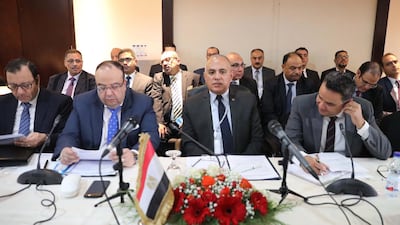 Egyptian Irrigation Minister Mohamed Abdel Aty, centre, attends a meeting with his Ethiopian and Sudanese counterparts, in Khartoum. EPA