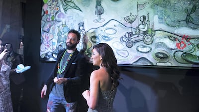 Artist Sacha Jafri and Eva Longoria inside the Global Gift Gala, at the Waldorf Astoria Dubai Palm Jumeirah, Dubai on Tuesday, December 17. Courtesy Faux Consultancy