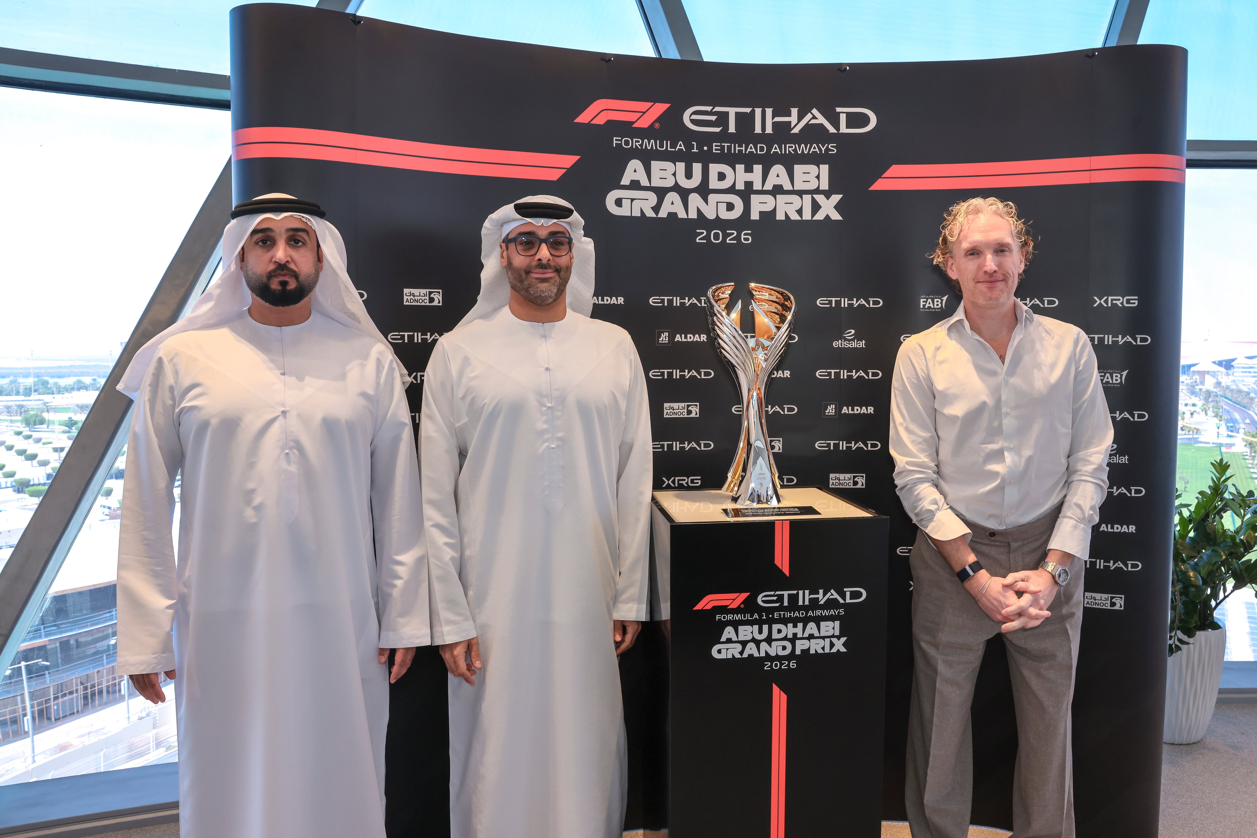 From left: Ali Al Beshr, general manager, Yas Marina Circuit, Saif Al Noaimi, Ethara chief executive, and David Powell, Ethara's chief portfolio & strategy officer. Victor Besa / The National