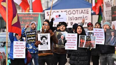 Iranian exiles and supporters of monarchy shout slogans during a demonstration near the Coburg palace during a meeting of the JCPOA in Vienna on Friday. AFP