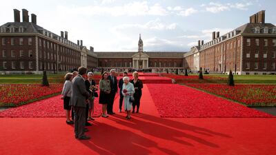 Queen Elizabeth visits the 5000 Poppies Garden at the 2016 Chelsea Flower Show. Getty Images