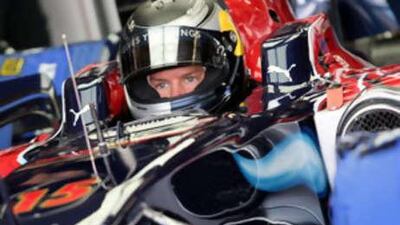 The Toro Rosso of Sebastien Vettel sits in the pits at Silverstone. The team's short-term future has been assured.
