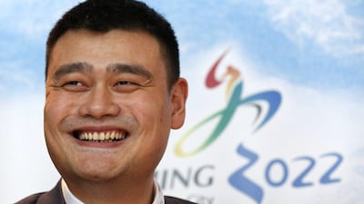 Yao Ming, retired Chinese professional basketball player, smiles during a press conference for the Beijing 2022 Winter Olympics on Wednesday in Kuala Lumpur. Vincent Thian / AP / July 29, 2015