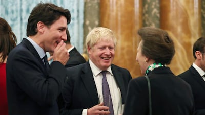 Britain's Princess Anne, right, talks to Nato delegates from left, Canadian Prime Minister Justin Trudeau and Britain's Prime Minister Boris Johnson. AP