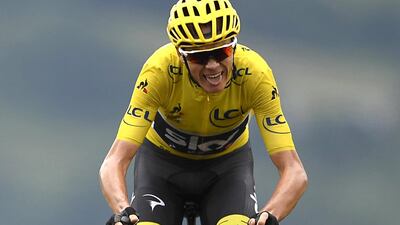 (FILES) In this file photo taken on July 13, 2017, Great Britain's Christopher Froome, wearing the overall leader's yellow jersey, rides towards the finish line at the end of the 214,5 km twelfth stage of the 104th edition of the Tour de France cycling race between Pau and Peyragudes. Chris Froome was cleared on July 2, 2018 of wrongdoing in his 'anti-doping' case which had cast a shadow over his participation in the Tour de France. "The Union Cycliste Internationale (UCI) confirms that the anti-doping proceedings involving Mr Christopher Froome have now been closed," cycling's ruling body announced. Team Sky's four-time Tour de France champion has been under a cloud since he was found to have twice the permissible amount of asthma drug Salbutamol in his system during September's Vuelta a Espana, which he won. / AFP / Lionel BONAVENTURE