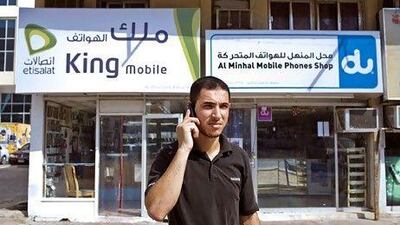 Many survey respondents said mobile phone charges by operators Etisalat and du were too expensive. Philip Cheung / The National