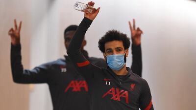 Mohamed Salah heads for training. Getty