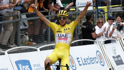 Tadej Pogacar of UAE Team Emirates celebrates after winning Stage 14, through the Pyrenees. EPA