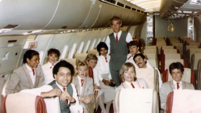 The crew on board an Emirates flight are all smiles. Emirates took delivery of its first bought aircraft, an Airbus 310 in 1987. The Airbus A310-300 was designed to Emirates specifications. Courtesy Emirates