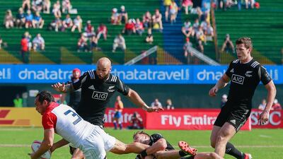 New Zealand took on France, in white, on Day 2 at the Dubai Rugby Sevens. Victor Besa for The National