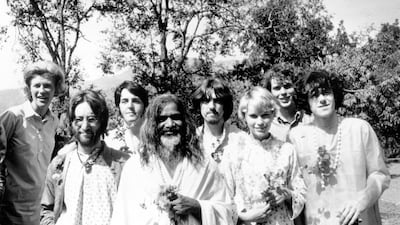 Maharishi Mahesh Yogi with members of the Beatles and other famous followers. Included in the group are, from left to right; unknown, John Lennon (1940 - 1980), Paul McCartney, Maharishi Mahesh Yogi, George Harrison (1943 - 2001), Mia Farrow, unknown, and Donovan. Getty Images