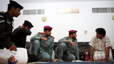 The Ministry of Civil Defense is launching a new program with an ambitious objective: inspect every home in the UAE to make sure they are up to date with fire safety codes. Yahya Alyaarubi, right, the son of Yasser Alyaarubi, the owner of the first villa to be inspected, goes over a fire safety plan with officials.