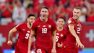 Dusan Vlahovic celebrates scoring Serbia's second goal. PA