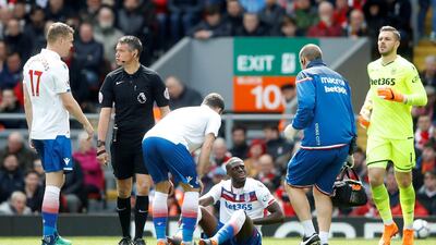 Stoke City's Bruno Martins Indi receives medical attention before being substituted off. Carl Recine / Reuters