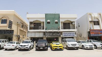 Residents in the Al Manakh area of Sharjah are upset about vehicles owned by nearby rental companies that take over the parking spaces and sometimes block in their vehicles. Reem Mohammed / The National
