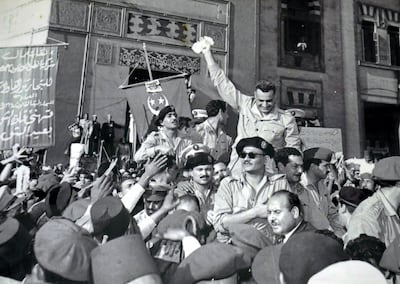 Gamal Abdel Nasser and members of the Revolutionary Command Council, welcomed by cheering crowds in Alexandria 1954, after the signing of the British withdrawal order. Nasser led the 1952 overthrow of the monarchy and introduced far-reaching land reforms the following year. (Universal History Archive / UIG via Getty