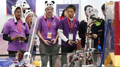 The World Robot Exhibition also held a robot contest for elementary school and junior high school teams. Wu Hong / EPA