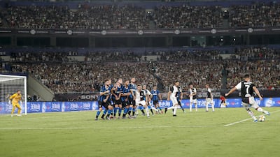 Cristiano Ronaldo scores his free kick for Juventus against Inter Milan. Getty Images