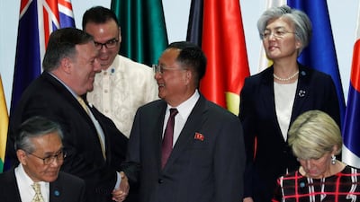 US Secretary of State Mike Pompeo shakes hands with North Korea's Foreign Minister Ri Yong Ho at the Asean Regional Forum in Singapore on August 4, 2018. Reuters