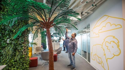 Visitors enjoying the Lego designs inside the office. Leslie Pableo for The National