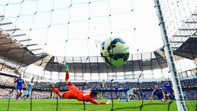 Frank Lampard of Manchester City scores the equalising goal past Chelsea goalkeeper Thibaut Courtois during their Premier League match at Etihad Stadium on September 21, 2014, in Manchester, England. Laurence Griffiths / Getty Images