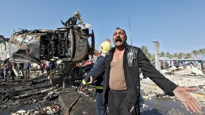 A man reacts to the ISIL-claimed suicide bombing attack at a checkpoint in the city of Hilla, south of Baghdad on March 6, 2016 which killed nearly 50 people - the deadliest attack in Iraq this year. Alaa Al-Marjani/Reuters