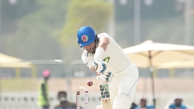Afghanistan batter Rahmat Shah’s off stump goes cartwheeling to a ball by Mark Adair on the opening day of the Test match at Tolerance Oval in Abu Dhabi on Wednesday, February 28, 2024. Abu Dhabi Cricket & Sports Hub