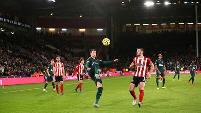 Newcastle's Javier Manquillo controls the ball closely watched by Jack O'Connell of Sheffield United. Getty