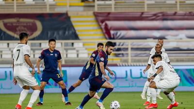 Al Wahda’s midfielder Omar Khrbin tries to break through the Al Jazira defence in the Arabian Gulf League matchweek 22 at Al Nahyan stadium on Sunday, March 21, 2021. Courtesy PLC