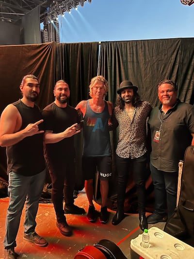 Naser Mestarihi and his band Winterburn meeting Guns N' Roses member Duff McKagan before their performance in Bahrain. Credit: Naser Mestarihi