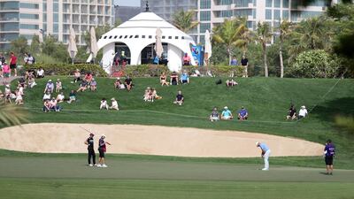 Lee Westwood putts on the 7th hole. Chris Whiteoak / The National
