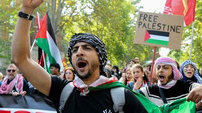 Activists in Milan. AFP