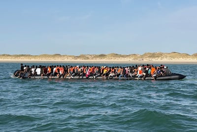 This mega-dinghy was spotted setting out from France carrying 230 migrants. AFP