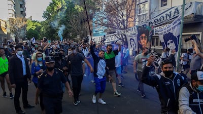 Fans of Diego Maradona show their support as Maradona is transferred from La Plata to Buenos Aires for his operation. EPA