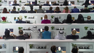 ABU DHABI, UNITED ARAB EMIRATES - February 4, 2019: Day two of the UAE papal visit - Guests watch His Eminence Dr Ahmad Al Tayyeb, Grand Imam of the Al Azhar Al Sharif on screens deliver a speech during the Human Fraternity Meeting, at The Founders Memorial. ( Eissa Al Hammadi / Ministry of Presidential Affairs ) ---