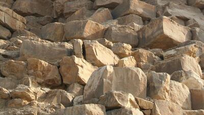 A damaged corner of the Bent Pyramid. It's the only remaining pyramid to retain most of its outer limestone casing. Courtesy Peter James