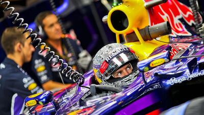 Sebastian Vettel of Red Bull Racing waits during the first practice session at the Formula One circuit in Monza, Italy, on September 5, 2014. Srdjan Suki / EPA