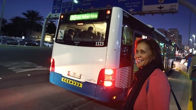 Elaine Van Heerden gets up early in the mornings to catch the bus to work. Her ticket costs her Dh80 a month. Delores Johnson / The National