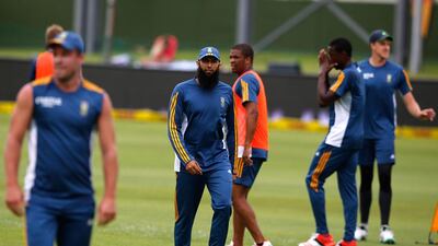 South Africa captain Hashim Amla, centre, is confident his team can defeat the West Indies in the third and final Test as long as the weather is kinder than their previous encounter. Marco Longari/AFP Photo