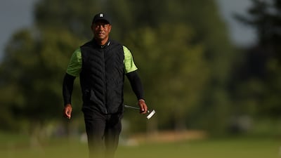 Tiger Woods walks to the 18th green as he finishes his first round at the JP McManus Pro-Am. Getty