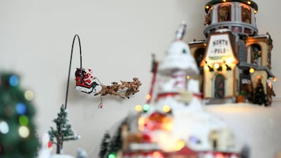 A flying Santa Claus sleigh in the North Pole section.