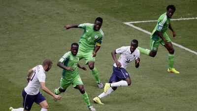 Karim Benzema of France, left, in action during his side's win over Nigeria on Monday at the 2014 World Cup in Brasilia, Brazil. Dennis Sabangan / EPA