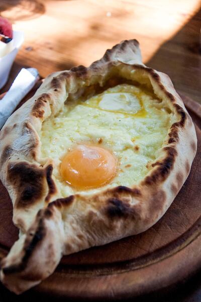 Acharuli khachapuri - bread with melted cheese and an egg yolk. Courtesy Emily Price