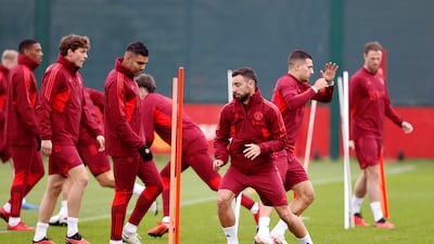 Manchester United's Bruno Fernandes during a training session with teammates in Carrington on Monday. PA