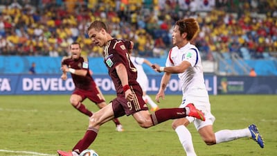 Alexander Kokorin, No 9, of Russia shoots at goal during the 2014 Fifa World Cup Group H match against South Korea at Arena Pantanal on June 17, 2014 in Cuiaba, Brazil. Adam Pretty / Getty Images