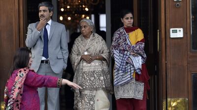 JP Singh (L), the Indian Deputy high commissioner, stands with the mother, Avanti Jadhav (C), and wife Chetankul Jadhav of Kulbhushan Jadhav, an Indian naval officer imprisoned in Pakistan. T Mughal / EPA
