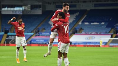 Marcus Rashford celebrates with Bruno Fernandes after scoring the opening goal. EPA